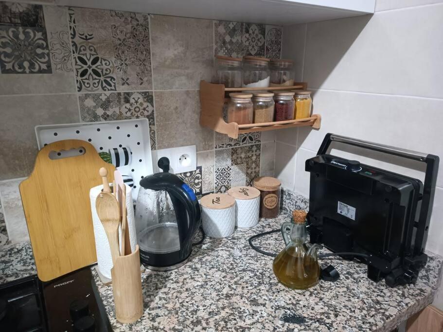 Kuchyň nebo kuchyňský kout v ubytování Superbe appartement neuf en résidence avec piscine