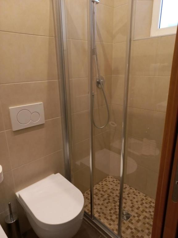 Koupelna v ubytování Hotel Helvetia