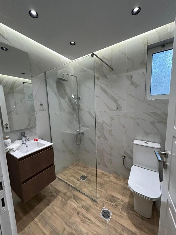 A bathroom at Maria's Apartments