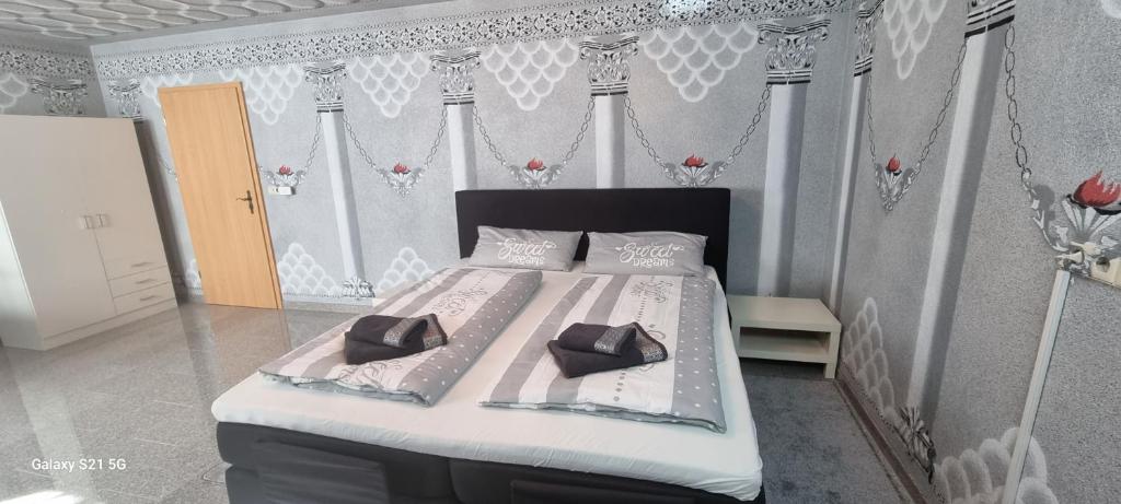 Katil atau katil-katil dalam bilik di Ferienwohnung Elefanten