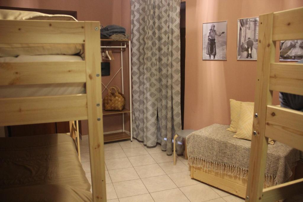 Postel nebo postele na pokoji v ubytování Casa Vacanze Sud e Magia