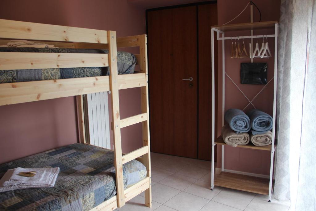 Palanda nebo palandy na pokoji v ubytování Casa Vacanze Sud e Magia