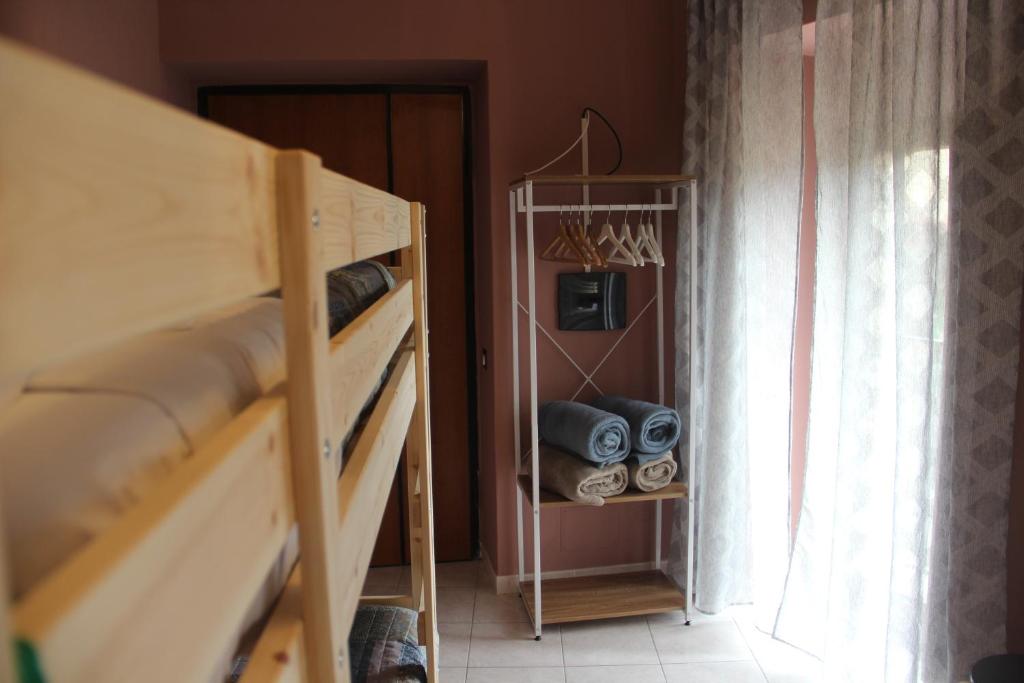 Palanda nebo palandy na pokoji v ubytování Casa Vacanze Sud e Magia
