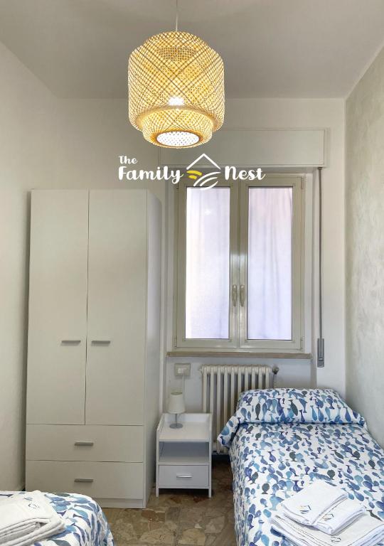 Łóżko lub łóżka w pokoju w obiekcie The Family Nest - Casa Eva