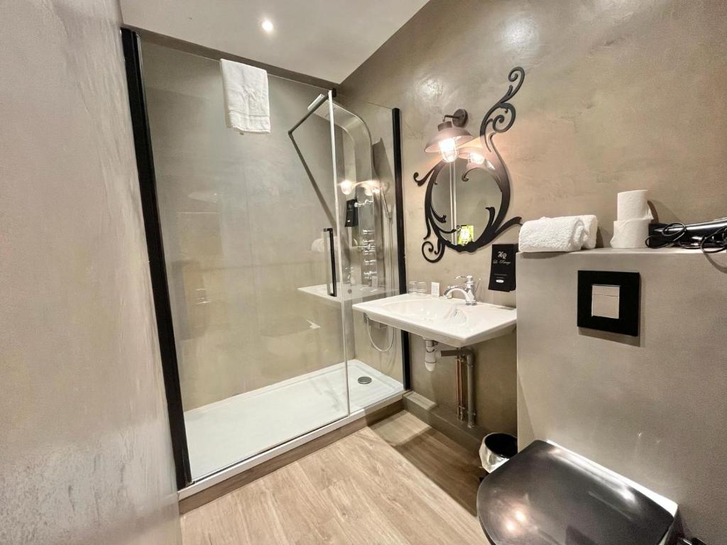 Koupelna v ubytování Logis Hôtel Le Rivage
