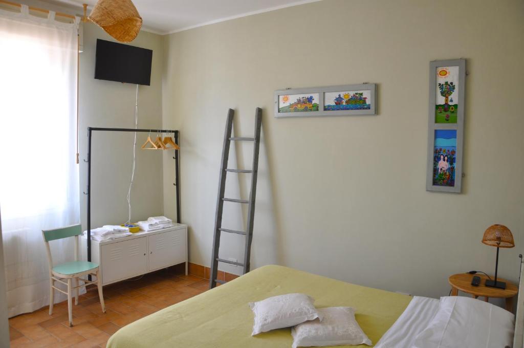 Postel nebo postele na pokoji v ubytování Casa Dona' Penne