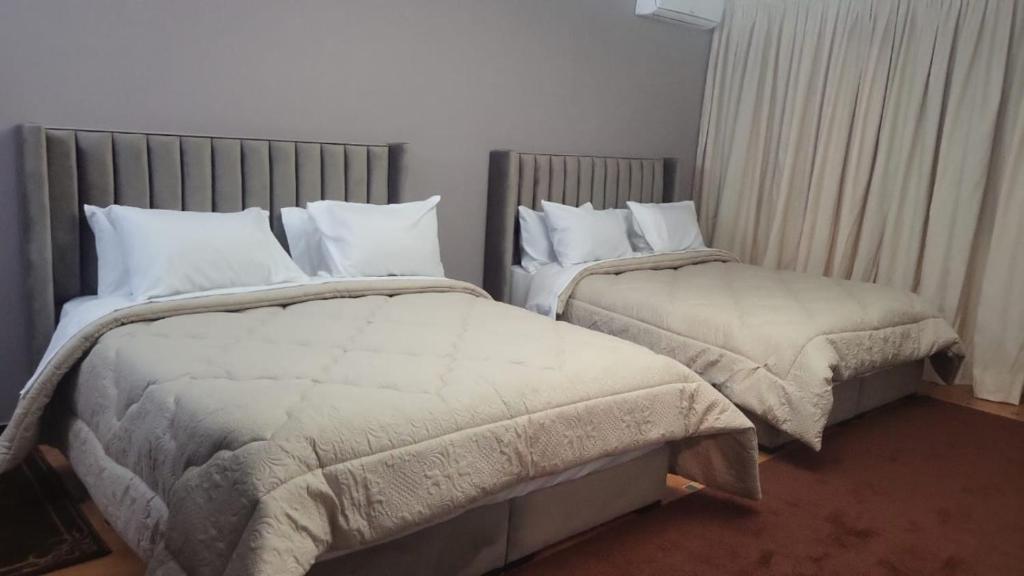 Postel nebo postele na pokoji v ubytování VILLA ADAM TANGIER