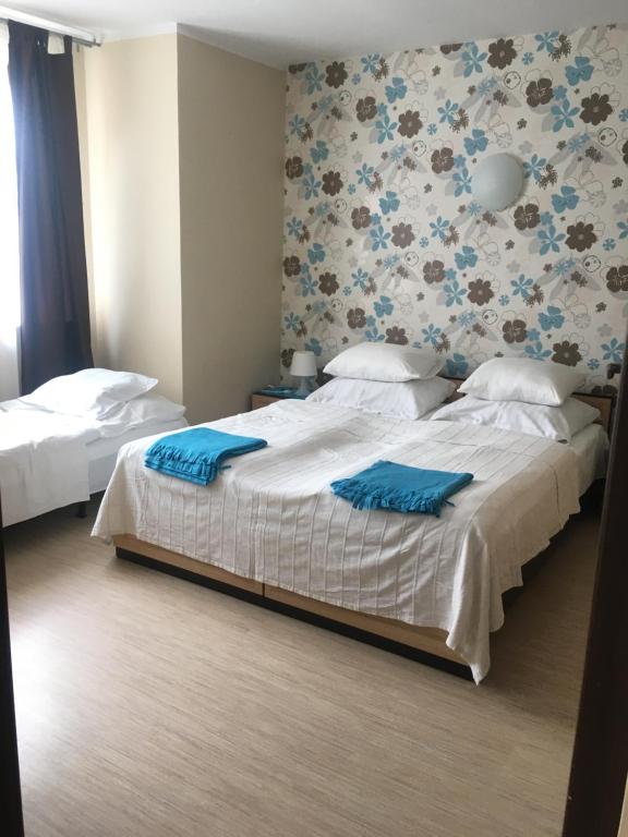Postel nebo postele na pokoji v ubytování PATIO dom gościnny