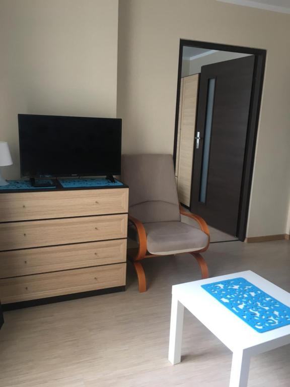 TV a/nebo společenská místnost v ubytování PATIO dom gościnny