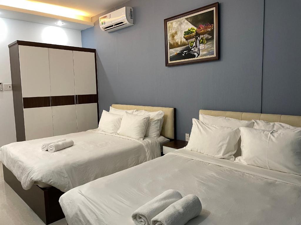 Postel nebo postele na pokoji v ubytování Nice Penthouse 4 bed room in Vung Tau