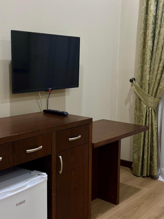 TV a/nebo společenská místnost v ubytování Rritja e Koranit
