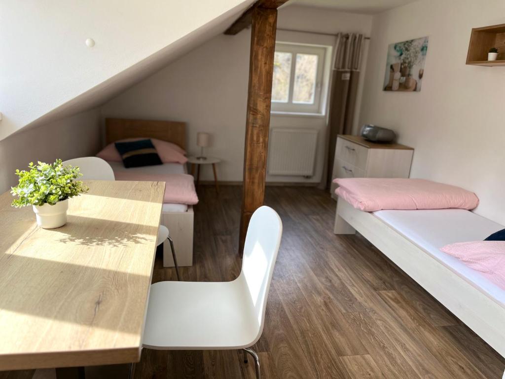 Postel nebo postele na pokoji v ubytování Apartmány Rosenberg