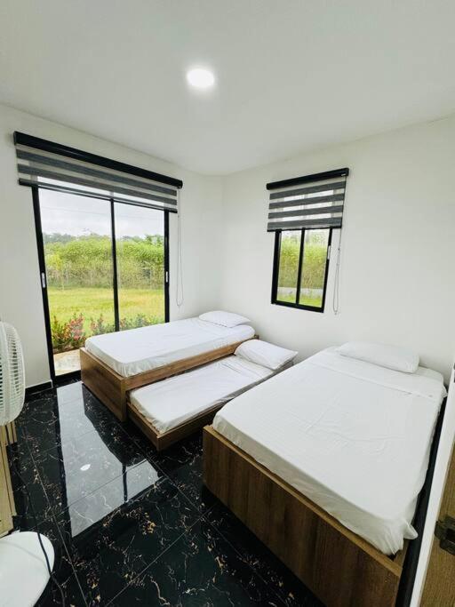 Postel nebo postele na pokoji v ubytování Villa Bella Verde