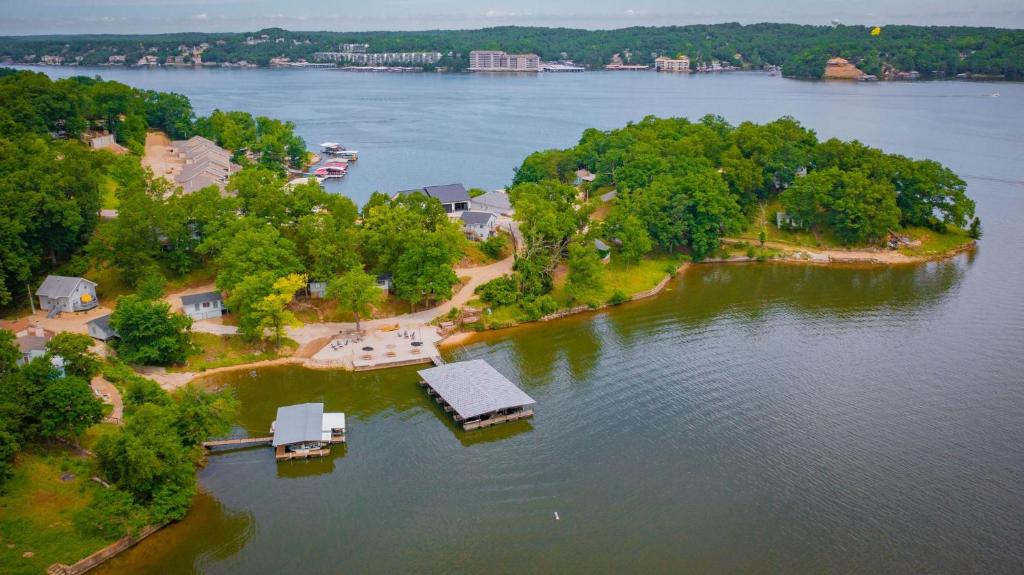 an aerial view of a small island in the water at Tree House , Bagnell Dam area in Lake Ozark