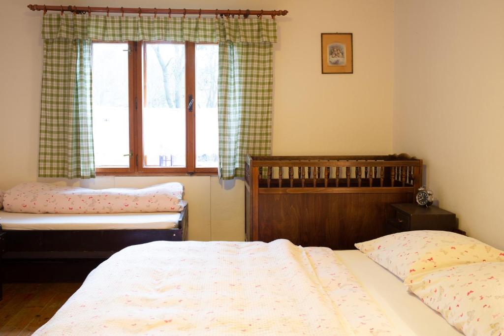 Postel nebo postele na pokoji v ubytování Chalupa na Valašsku