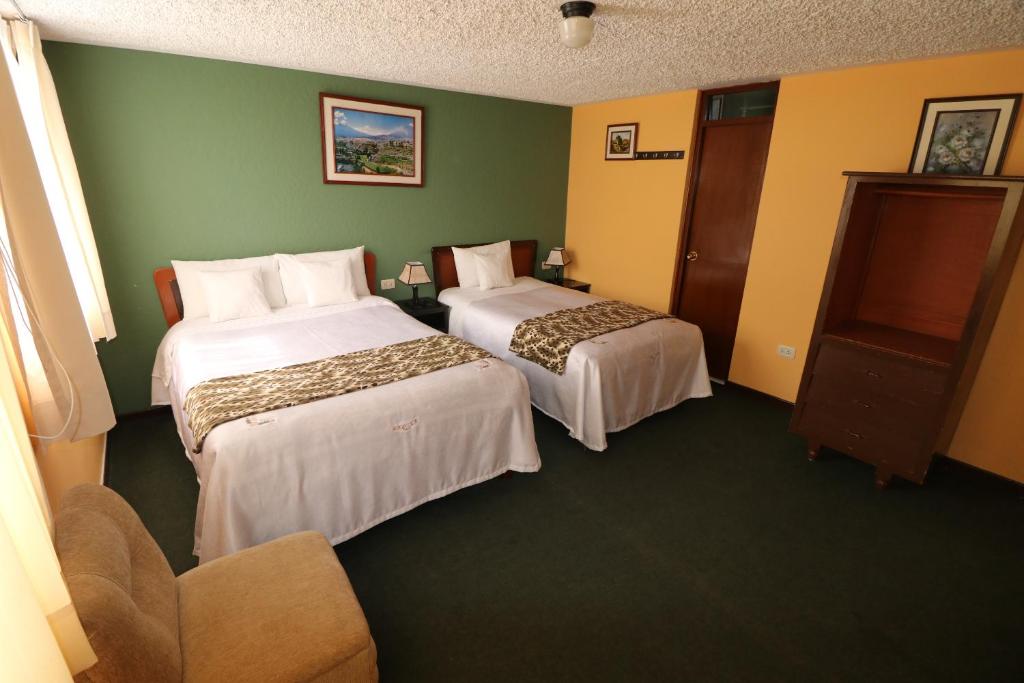 Postel nebo postele na pokoji v ubytování La Posada del Colca