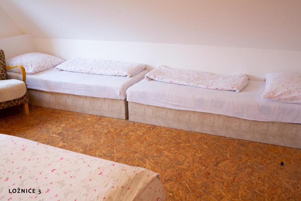 Postel nebo postele na pokoji v ubytování Chalupa na Valašsku