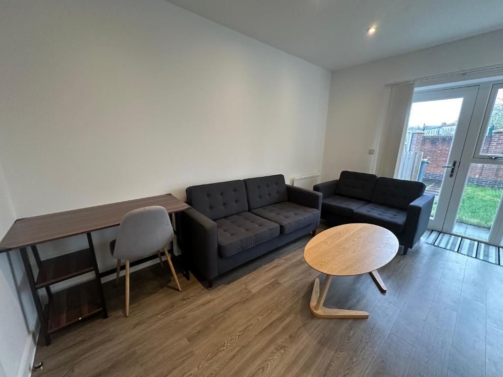 Posezení v ubytování C U Property Ltd