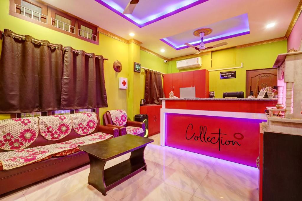 a salon with a waiting room with chairs and a counter at OYO Flagship Hotel Maa Bharati in Guwahati