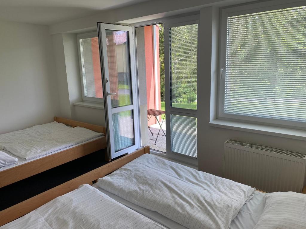 Postel nebo postele na pokoji v ubytování Apartman A1 Golem