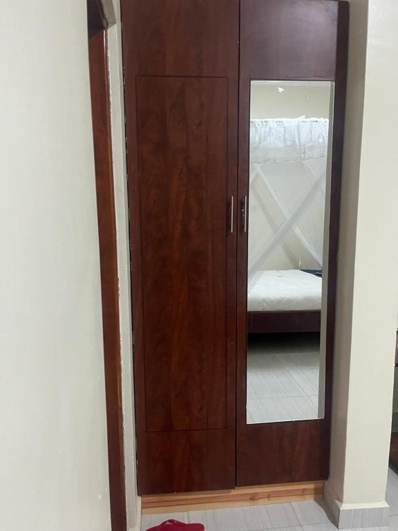 Postel nebo postele na pokoji v ubytování Eliora Hotel, Tororo