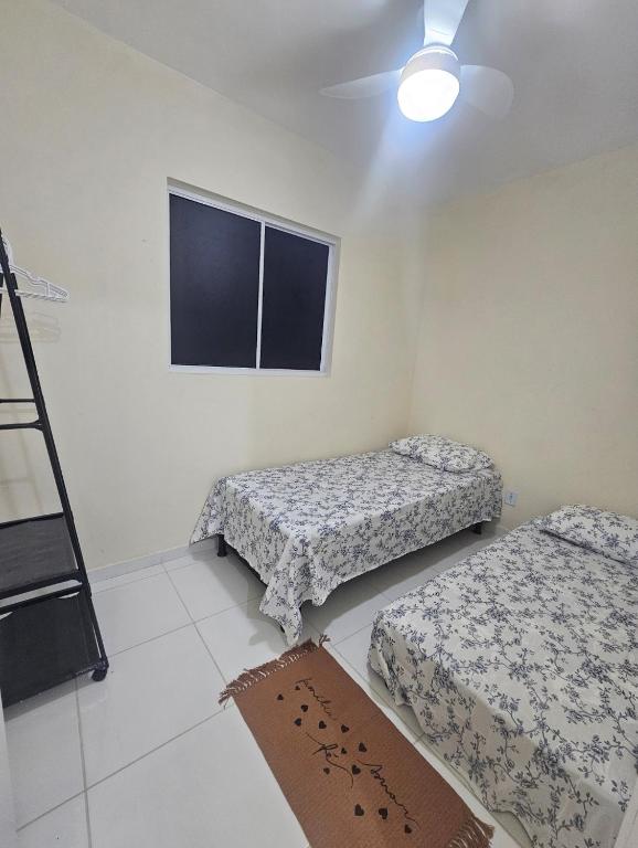 Postel nebo postele na pokoji v ubytování Marques Beach House
