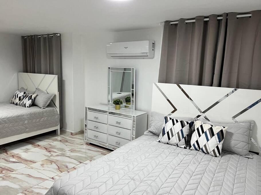 Postel nebo postele na pokoji v ubytování Moderno Apt en la ciudad