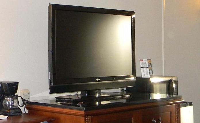 TV a/nebo společenská místnost v ubytování Downtown Inn