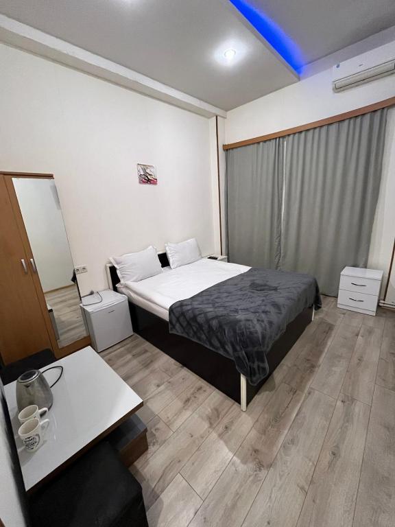 Postel nebo postele na pokoji v ubytování Hotel G&G