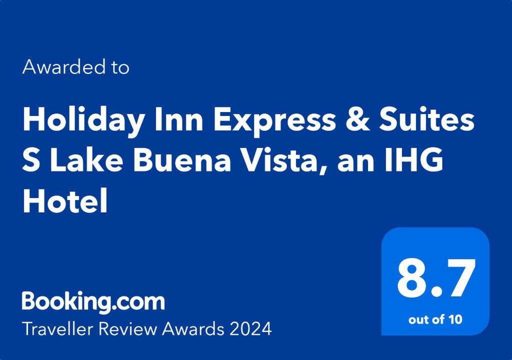 a blue sign that reads holiday inn express and suites lake buena vista at Holiday Inn Express & Suites S Lake Buena Vista by IHG in Kissimmee