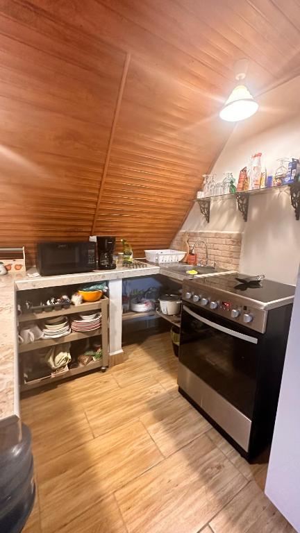 Kuchyň nebo kuchyňský kout v ubytování Casa María