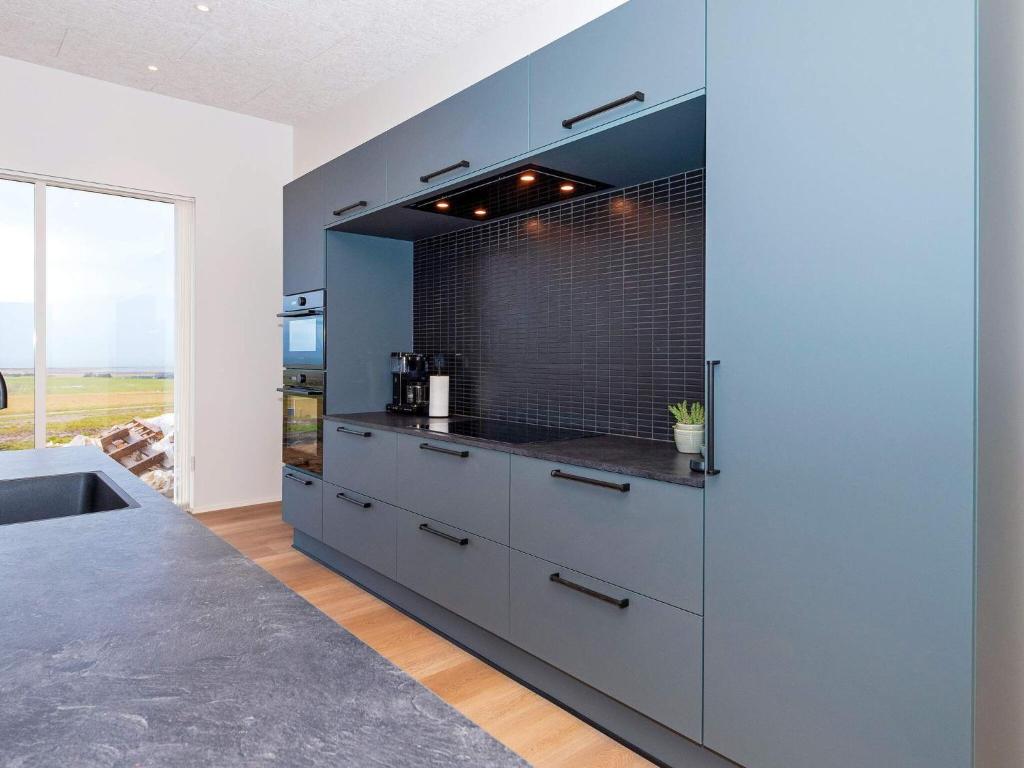 Kuchyň nebo kuchyňský kout v ubytování Holiday home Lemvig XLVII