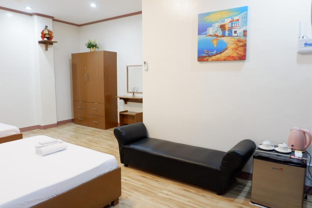 Postel nebo postele na pokoji v ubytování JUN's INN
