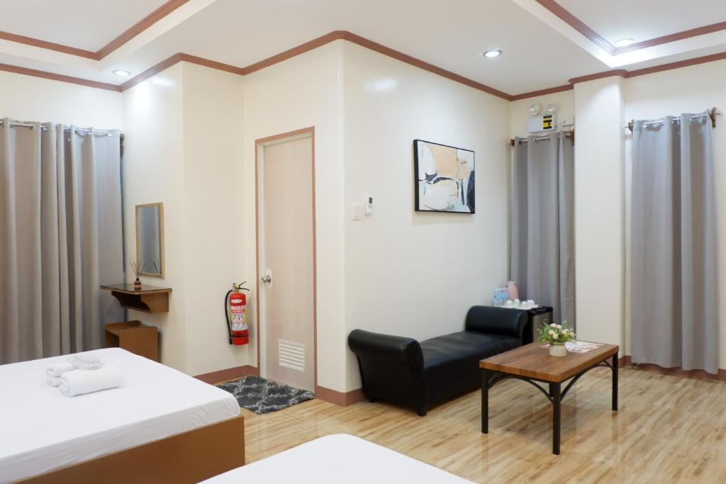 Postel nebo postele na pokoji v ubytování JUN's INN