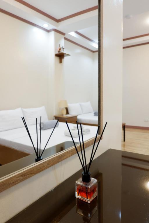 Postel nebo postele na pokoji v ubytování JUN's INN