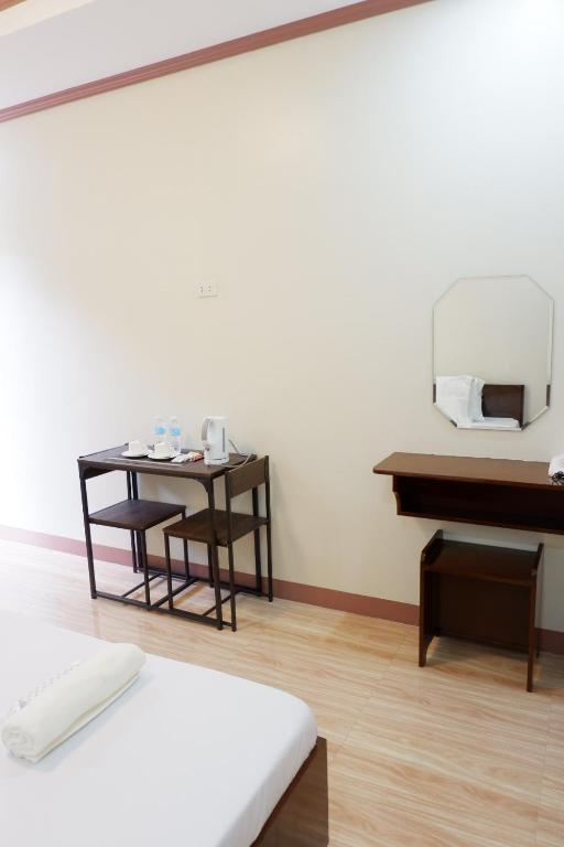 Postel nebo postele na pokoji v ubytování JUN's INN