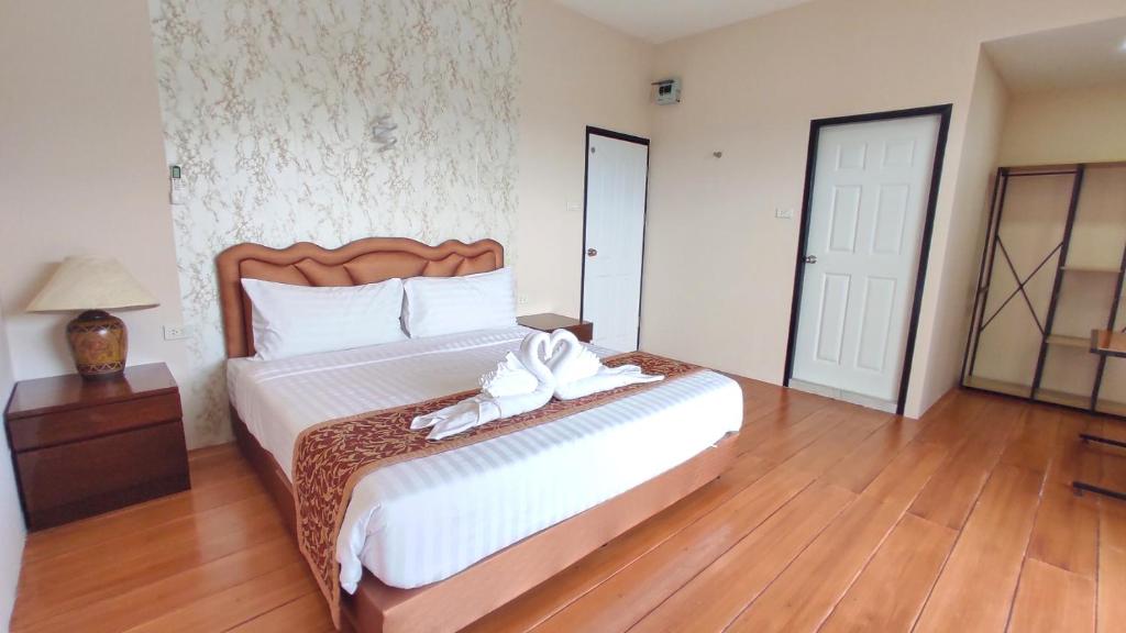 Postel nebo postele na pokoji v ubytování So View Phuket Resort