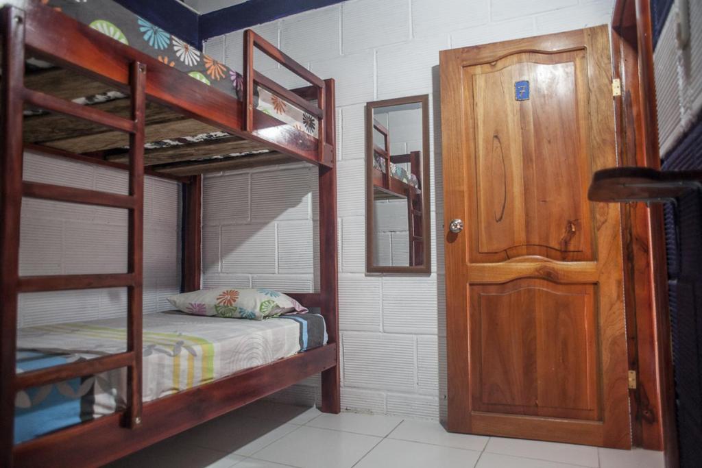 Postel nebo postele na pokoji v ubytování Hostel El Gran Azul Olon
