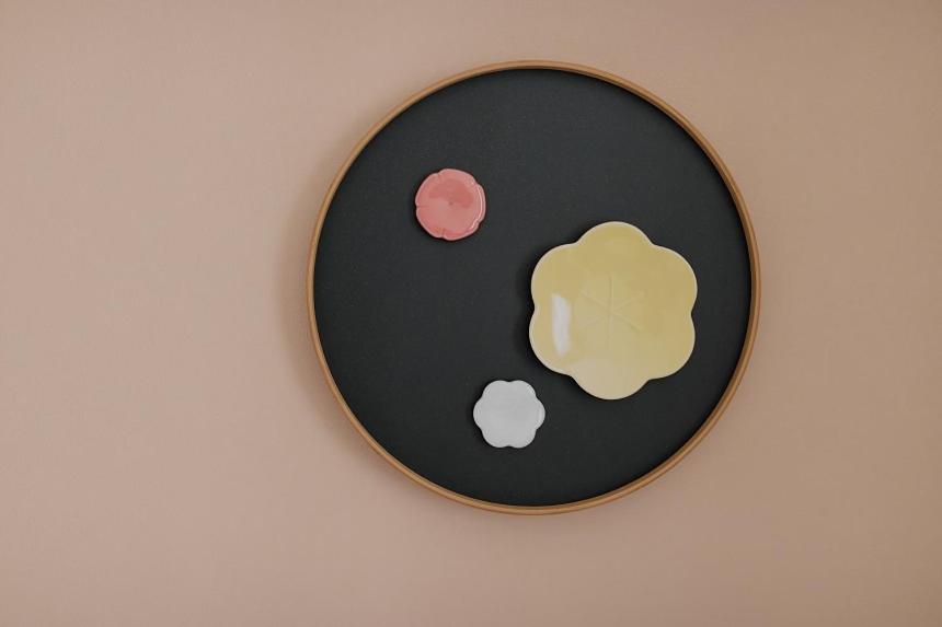 a plate with a cookie on a wall at Kyoto Tower Hotel in Kyoto