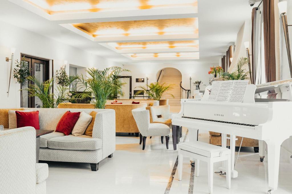 Posezení v ubytování Mamaison Le Regina Boutique Hotel