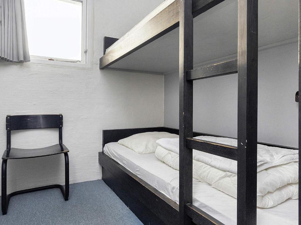 Postel nebo postele na pokoji v ubytování Apartment Brovst VIII