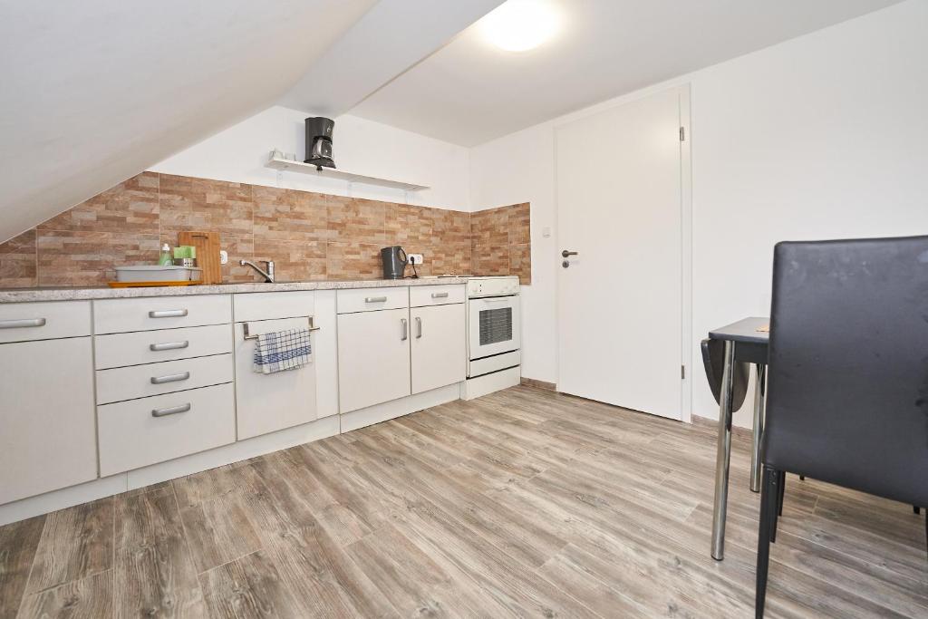 Kuchyň nebo kuchyňský kout v ubytování Monteurwohnung Glauchau
