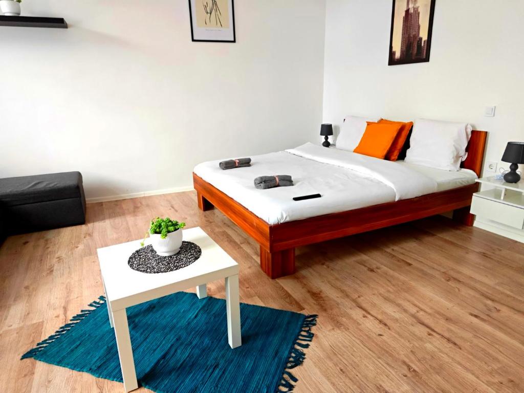 Postel nebo postele na pokoji v ubytování DáMa Apartments