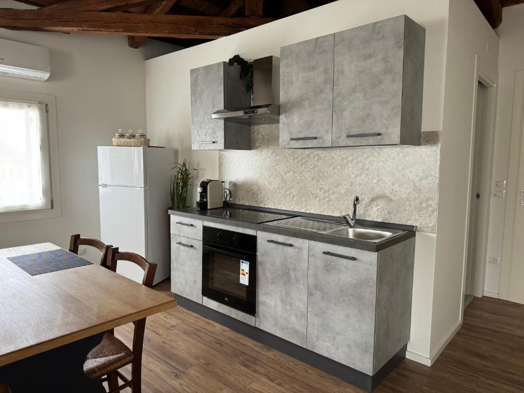 Kuchyň nebo kuchyňský kout v ubytování Casa Toè Quinto