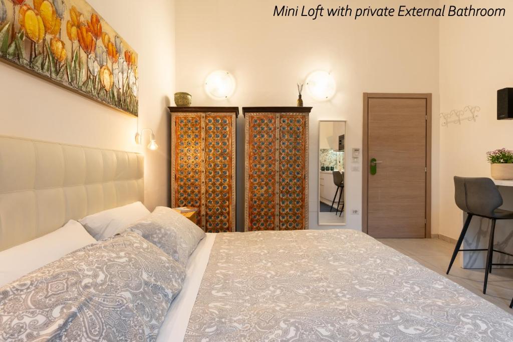 Łóżko lub łóżka w pokoju w obiekcie APARTMENT 20