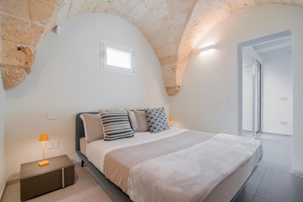 Postel nebo postele na pokoji v ubytování Chapeau Apartment - Lecce Selection