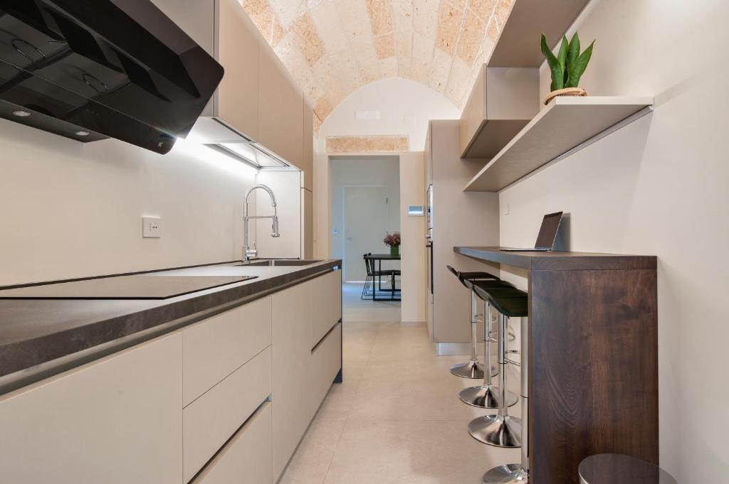 Kuchyň nebo kuchyňský kout v ubytování Chapeau Apartment - Lecce Selection