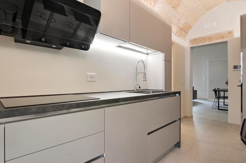 Kuchyň nebo kuchyňský kout v ubytování Chapeau Apartment - Lecce Selection