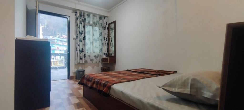Postel nebo postele na pokoji v ubytování Kaskilay