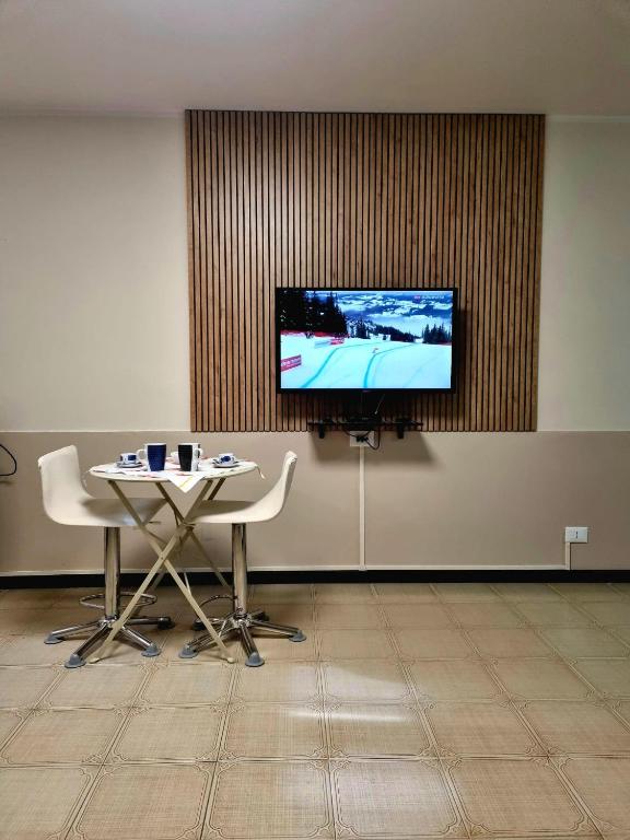 TV a/nebo společenská místnost v ubytování Cinzia's Home